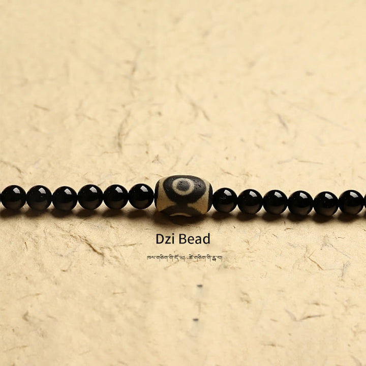 Buddha Stones Tibetano 108 Mala Beads Onice Nero Tre Occhi Dzi Beads Bracciale di Protezione - image 14