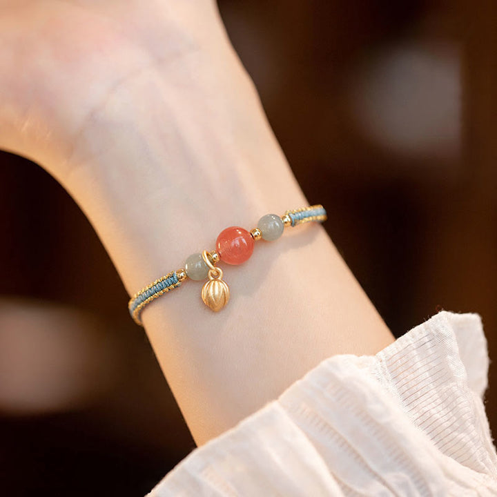 Braccialetto Buddha Stones Red Agate Jade Lotus Confidence Calm String