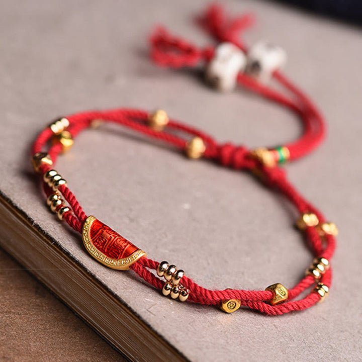 Braccialetto di corda rossa intrecciata con design di gnocchi di cinabro fatti a mano Buddha Stones