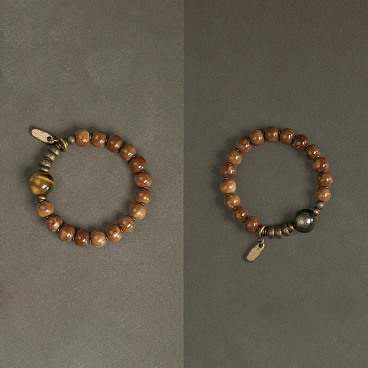 Braccialetto per la fortuna, in ottone, rame e ossidiana , Buddha Stones , semi di Kuka, occhio di tigre e oro lucido - image 14