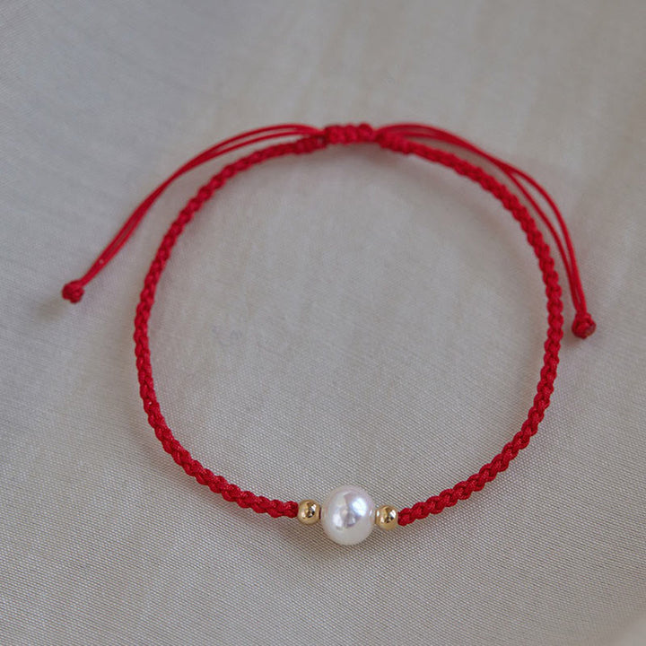 Braccialetto con treccia di perle naturali Buddha Stones Luck String