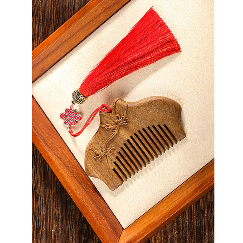 Pettine lenitivo inciso con motivo floreale in legno di sandalo verde Buddha Stones