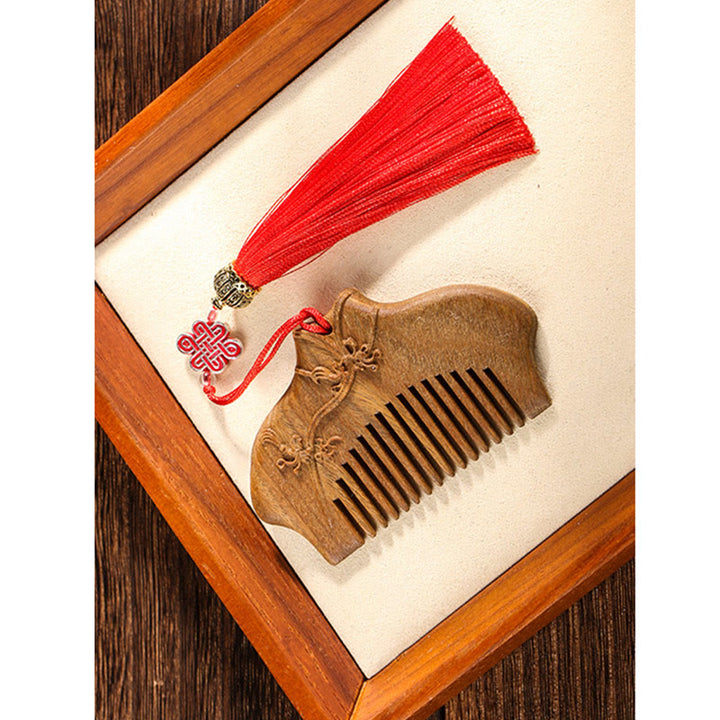 Pettine lenitivo inciso con motivo floreale in legno di sandalo verde Buddha Stones