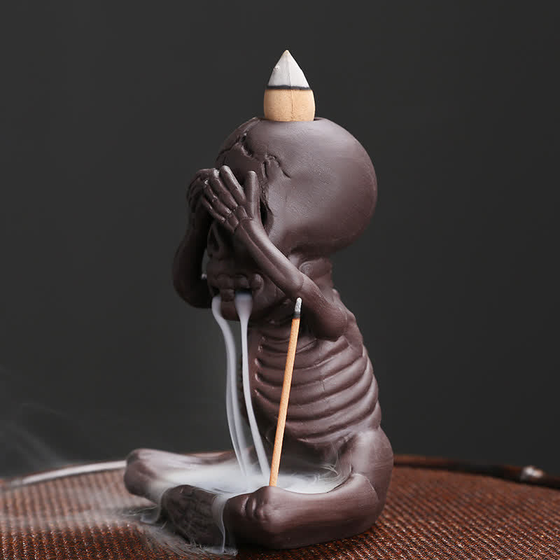 Buddha Stones Piccolo teschio Fantasma Argilla viola Fontana di fumo a riflusso Bruciatore di incenso della pace Decorazione