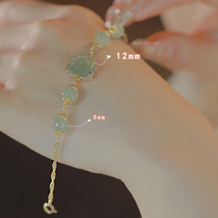 Bracciale con catena portafortuna in giada Hetian placcata in oro 14K con fiore rosa Buddha Stones