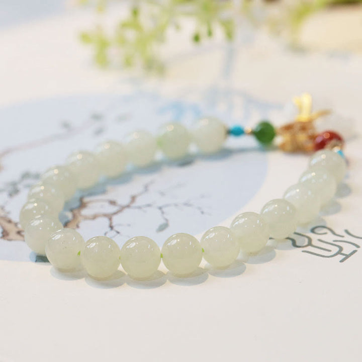 Braccialetto di benedizione con sacco di soldi placcato oro 14K in giada bianca naturale di Hetian Buddha Stones