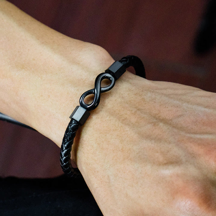 Bracciale Buddha Stones Endless Knot in acciaio al titanio con intreccio in pelle e bilanciamento