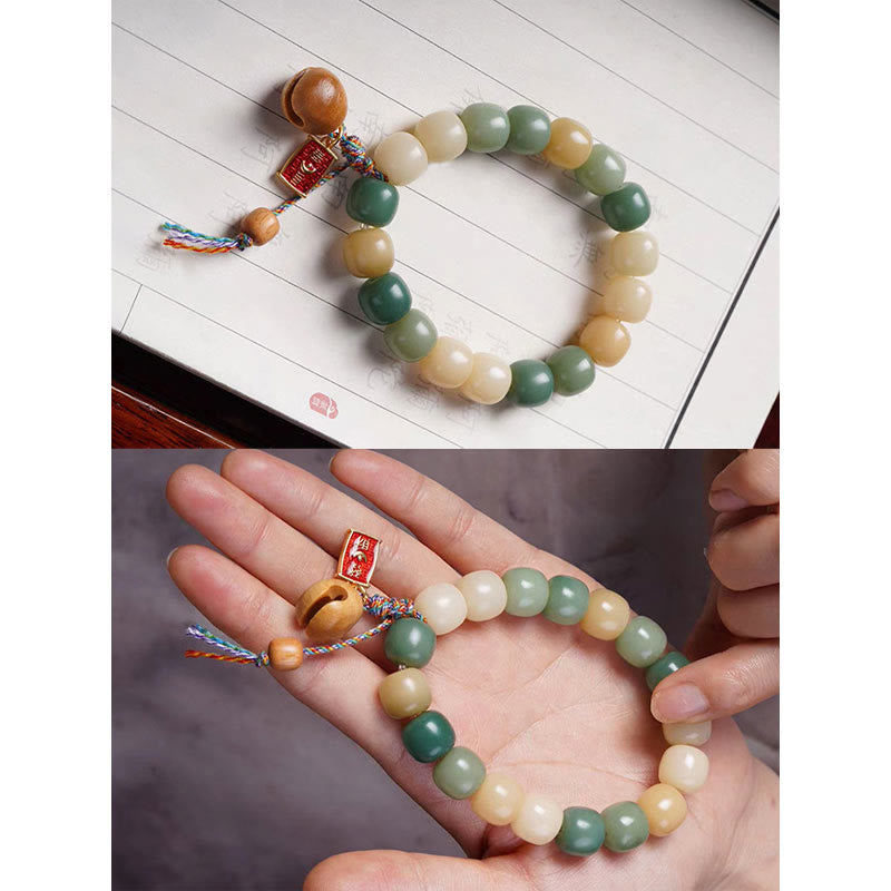 Braccialetto con ciondolo a tamburo di pesce in legno con semi di Bodhi e Buddha Stones, sfumatura naturale