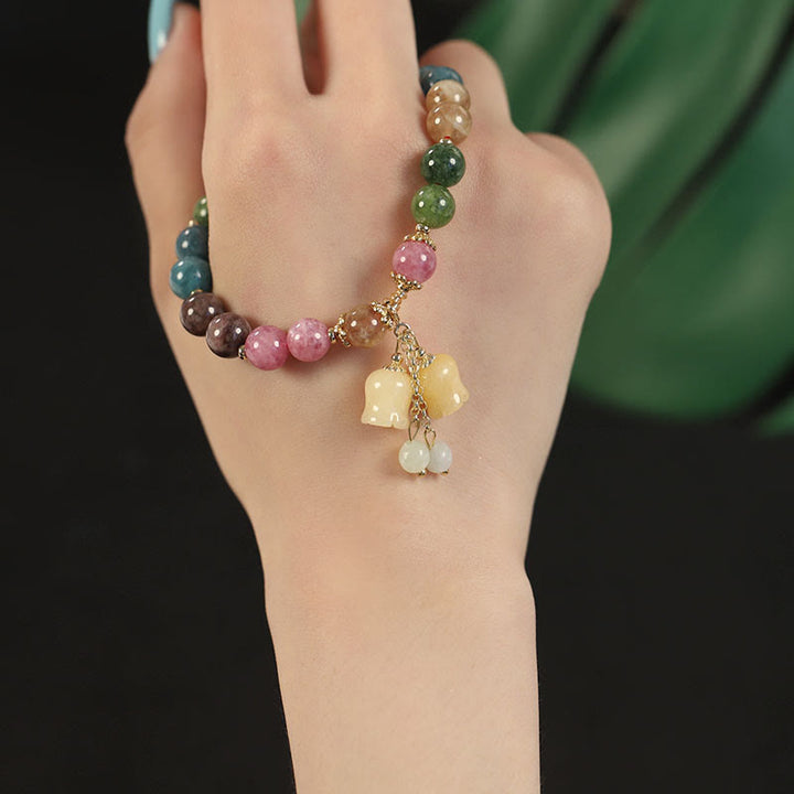 Braccialetto dell'amore con perline di fiori di tormalina colorata naturale Buddha Stones