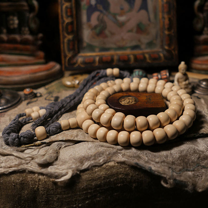 Buddha Stones 108 Mala Perle Abelia Biflora Legno Allontanando gli Spiriti Maligni Polso Mala