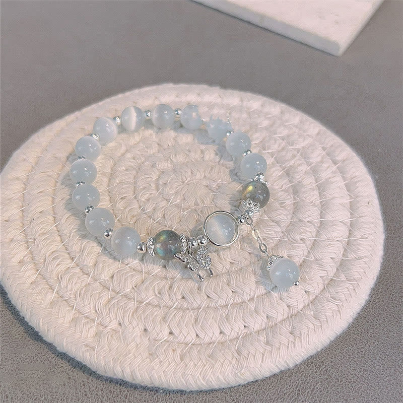 Braccialetto di supporto con ciondolo a forma di stella a forma di farfalla, pietra di luna e occhio di gatto Buddha Stones - image 5