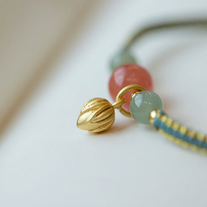Braccialetto Buddha Stones Red Agate Jade Lotus Confidence Calm String
