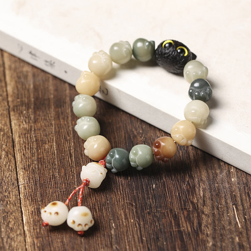 Buddha Stones Semi di Bodhi naturali Zampa adorabile Braccialetto di saggezza del gatto fortunato in legno di ebano - image 10