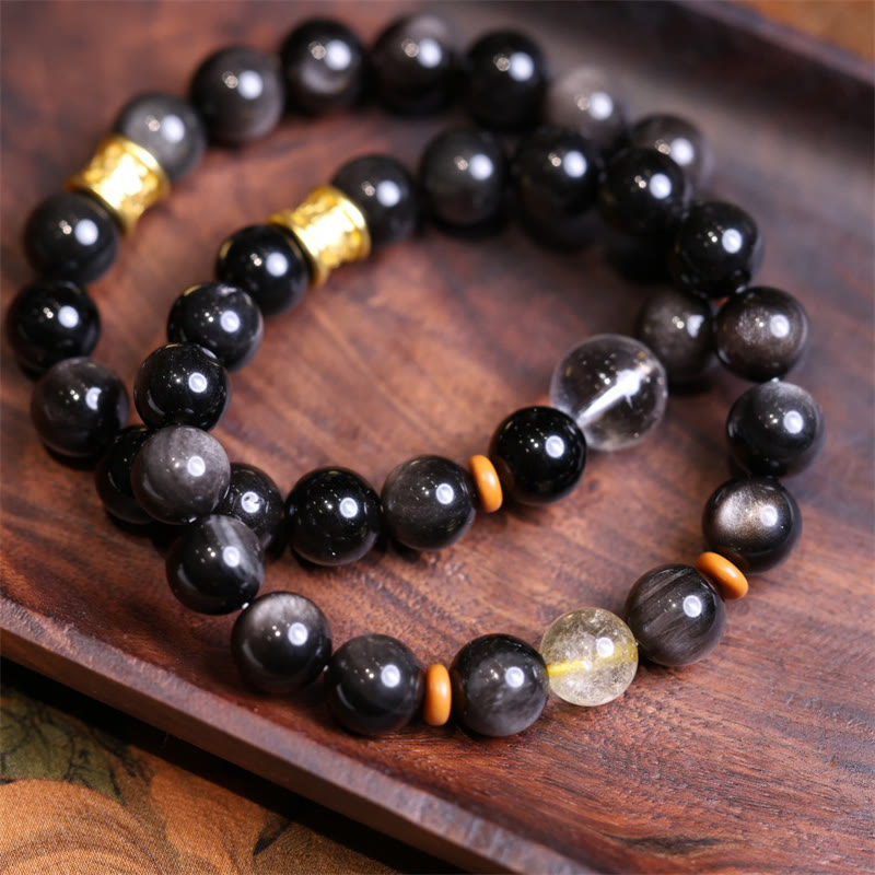Braccialetto di protezione con perline di cristallo di ossidiana lucida in argento naturale Buddha Stones Om Mani Padme Hum