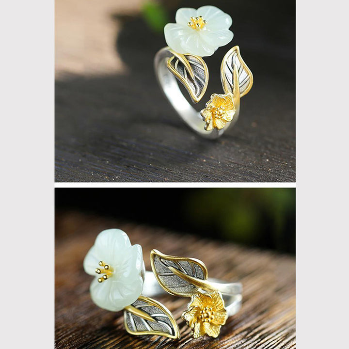 Anello portafortuna con fiore di prugna in giada bianca e rame placcato argento 925 Buddha Stones