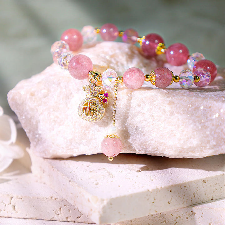 Braccialetto positivo con ciondolo a forma di sacchetto di denaro in cristallo di quarzo fragola naturale Buddha Stones