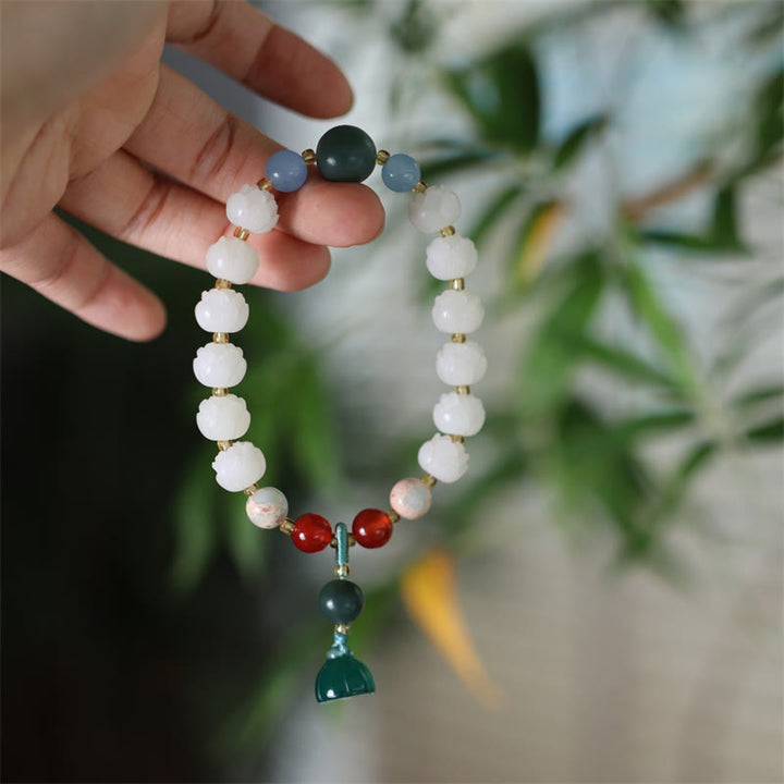 Braccialetto di armonia di pace intagliato con Buddha Stones