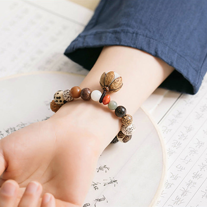 Bracciale Mala da polso Buddha Stones, semi di Bodhi, loto, saggezza, pace
