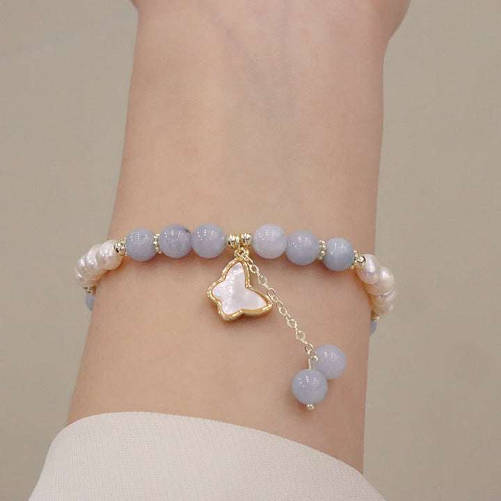Braccialetto con ciondolo a forma di farfalla con foglia di ginkgo e perle di acquamarina naturale Buddha Stones