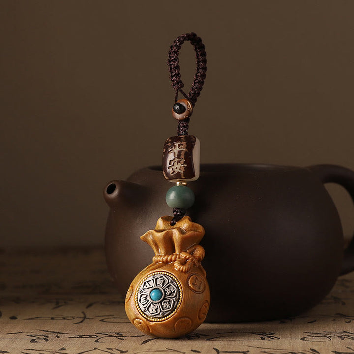 Buddha Stones Piccola foglia Sandalo rosso Sandalo verde Borsa per soldi Om Mani Padme Hum Portachiavi di protezione girevole Decorazione da appendere al telefono - image 9