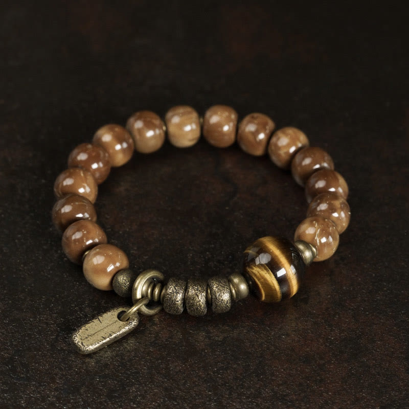 Braccialetto per la fortuna, in ottone, rame e ossidiana , Buddha Stones , semi di Kuka, occhio di tigre e oro lucido - image 3