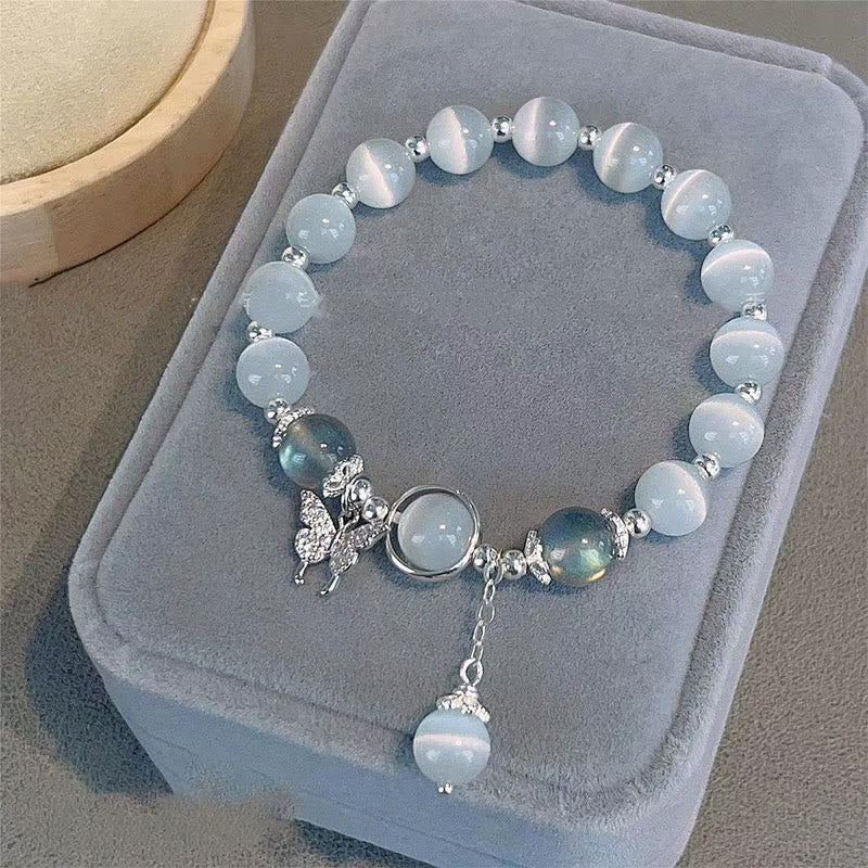 Braccialetto di supporto con ciondolo a forma di stella a forma di farfalla, pietra di luna e occhio di gatto Buddha Stones - Farfalla Occhio di Gatto e Pietra di Luna - image 0
