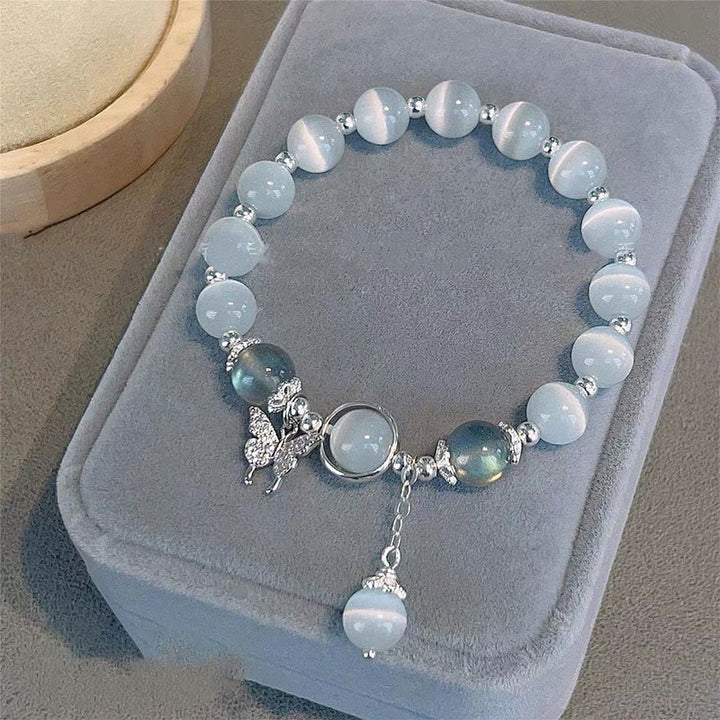 Braccialetto di supporto con ciondolo a forma di stella a forma di farfalla, pietra di luna e occhio di gatto Buddha Stones - Farfalla Occhio di Gatto e Pietra di Luna - image 0