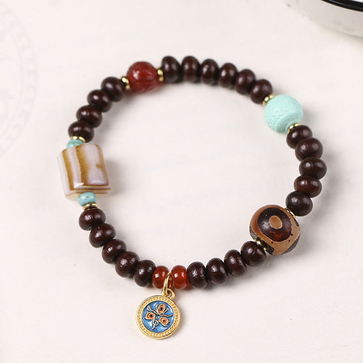 Buddha Stones naturali Tibet viola Bodhi Seed Dzi Bead Dio della ricchezza braccialetto di saggezza