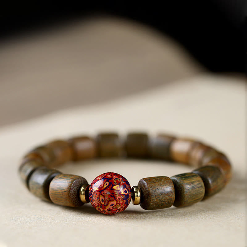 Braccialetto della pace con perline di lacca di sandalo rosso e piccole foglie di sandalo verde naturale Buddha Stones