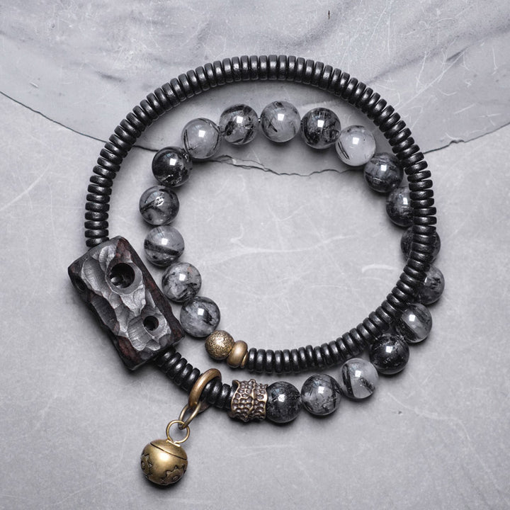 Braccialetto di coppia della saggezza del rame del legno di ebano del quarzo rutilato nero Buddha Stones