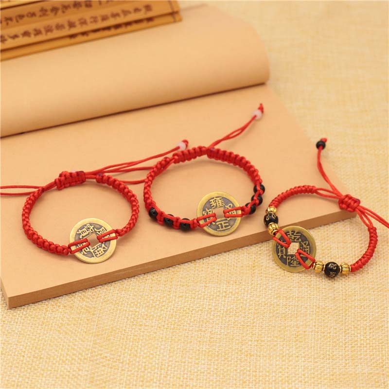 Braccialetto intrecciato con corda rossa, moneta di rame e Buddha Stones