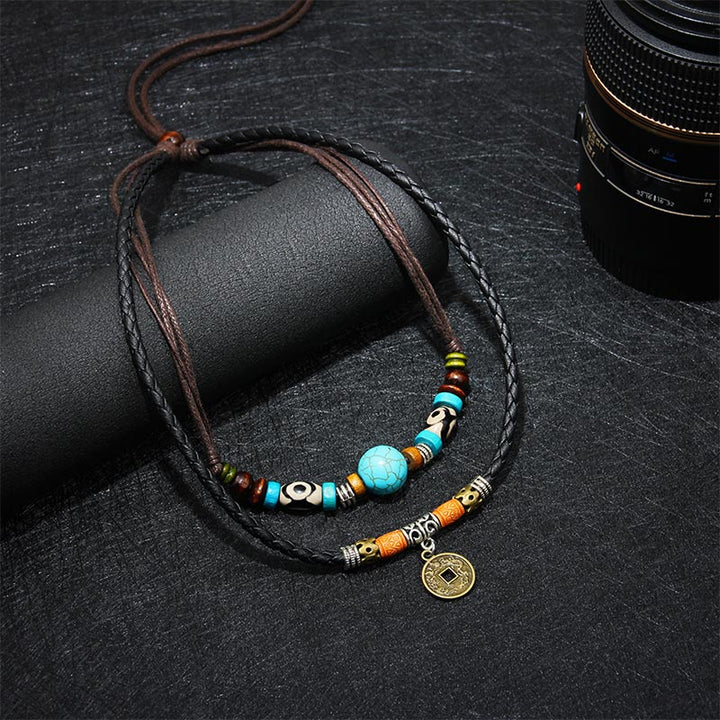 Buddha Stones Collana di protezione con perline Dzi turchesi - image 1