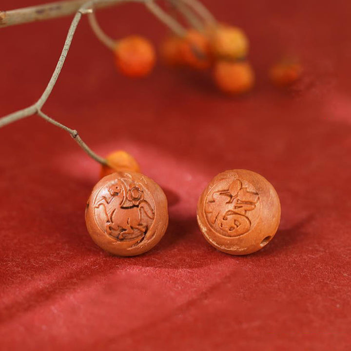 Braccialetto della ricchezza in cinabro intagliato con carattere dello zodiaco cinese Fu in legno di pesca naturale Buddha Stones - image 20
