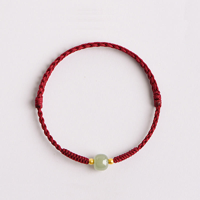 Bracciale intrecciato con Buddha Stones e portafortuna