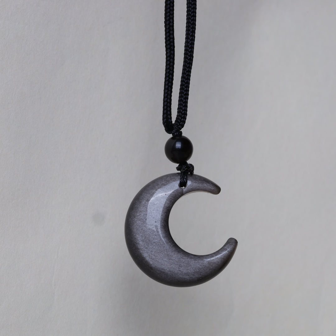 Collana con ciondolo a forma di mezzaluna stellata in ossidiana naturale Buddha Stones argento