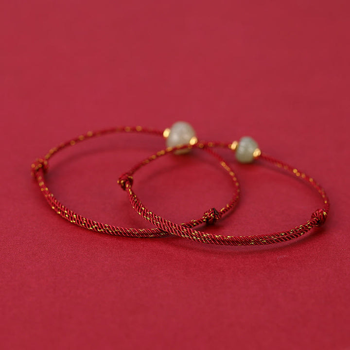 Bracciale Buddha Stones in argento sterling 925 placcato oro con giada Hetian e loto portafortuna in corda rossa - image 2