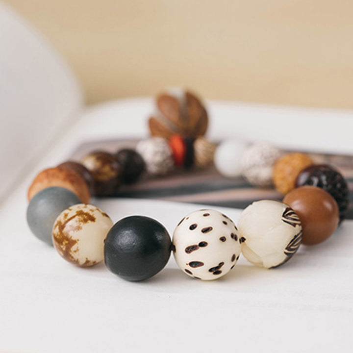 Bracciale Mala da polso Buddha Stones, semi di Bodhi, loto, saggezza, pace