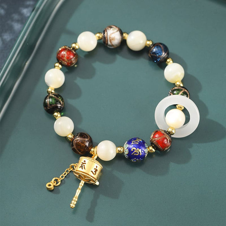 Buddha Stones Incenso Tibetano Cenere Vetro Liuli Pietra Tridacna Pietra del Sole Om Mani Padme Hum Ruota della Preghiera Braccialetto con Ciondolo