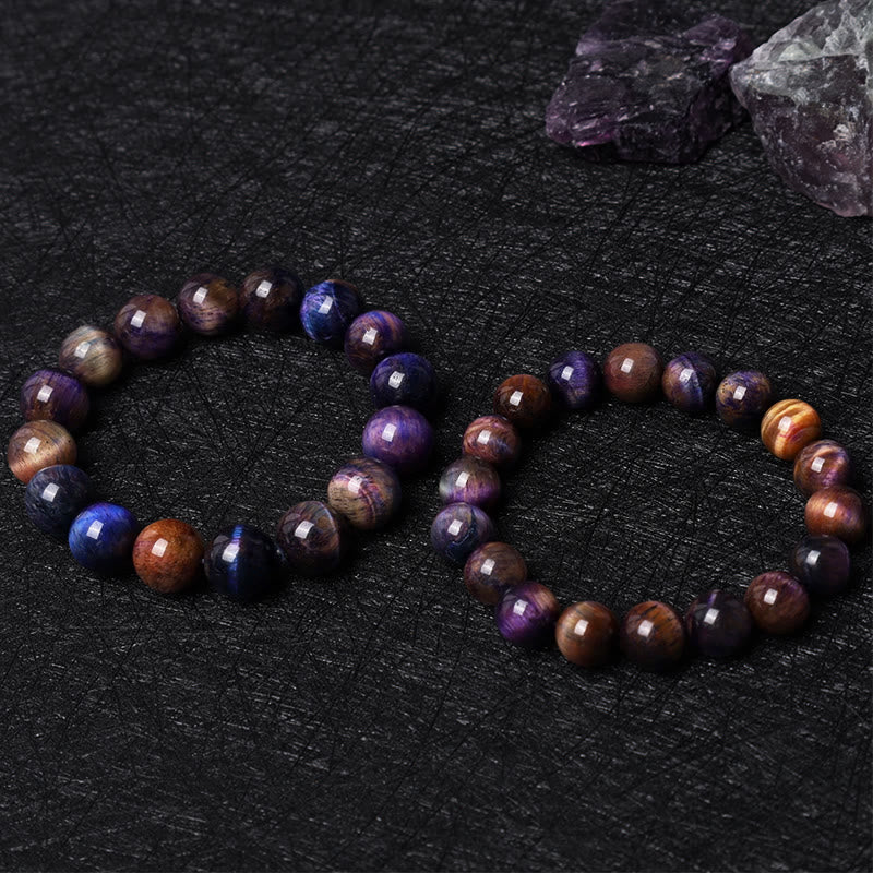 Braccialetto di protezione naturale con occhio di tigre viola Buddha Stones