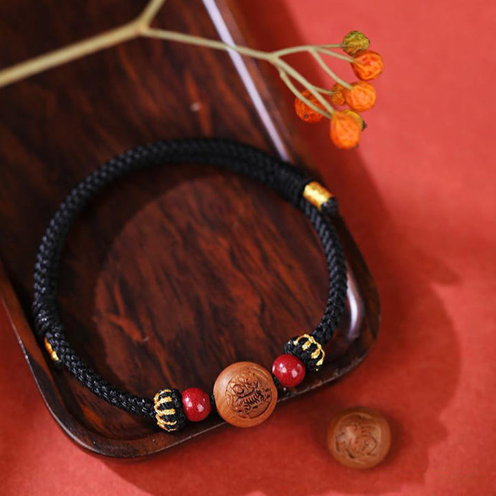 Braccialetto della ricchezza in cinabro intagliato con carattere dello zodiaco cinese Fu in legno di pesca naturale Buddha Stones - image 12