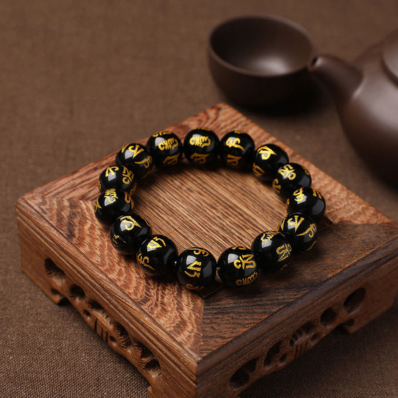Braccialetto di meditazione Om Mani Padme Hum in onice nero e cristallo bianco del Tibet Buddha Stones