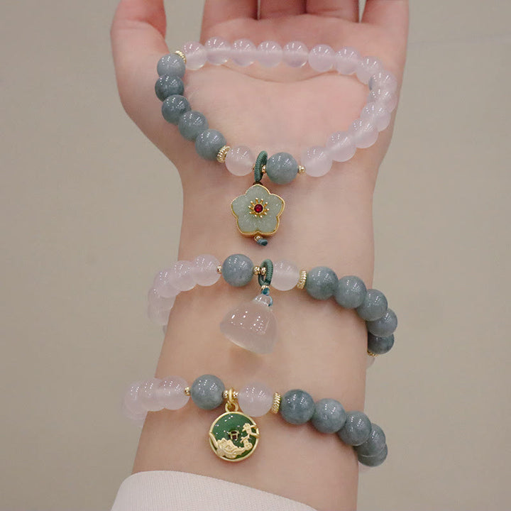 Braccialetto di protezione con fibbia della pace, fiore di loto, agata bianca e giada Buddha Stones