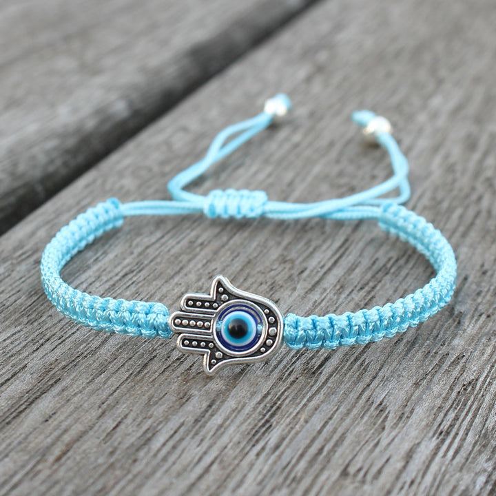 Braccialetto con cordino di protezione e fortuna con simbolo Hamsa fatto a mano con Buddha Stones