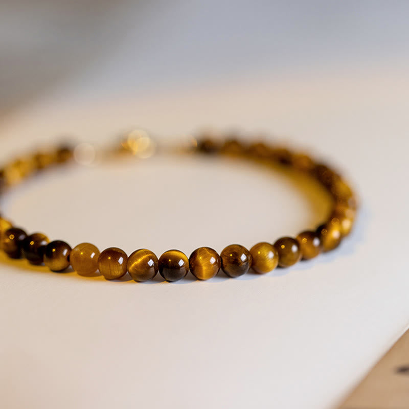 Braccialetto di protezione del coraggio in pietra naturale occhio di tigre placcato oro 14K Buddha Stones