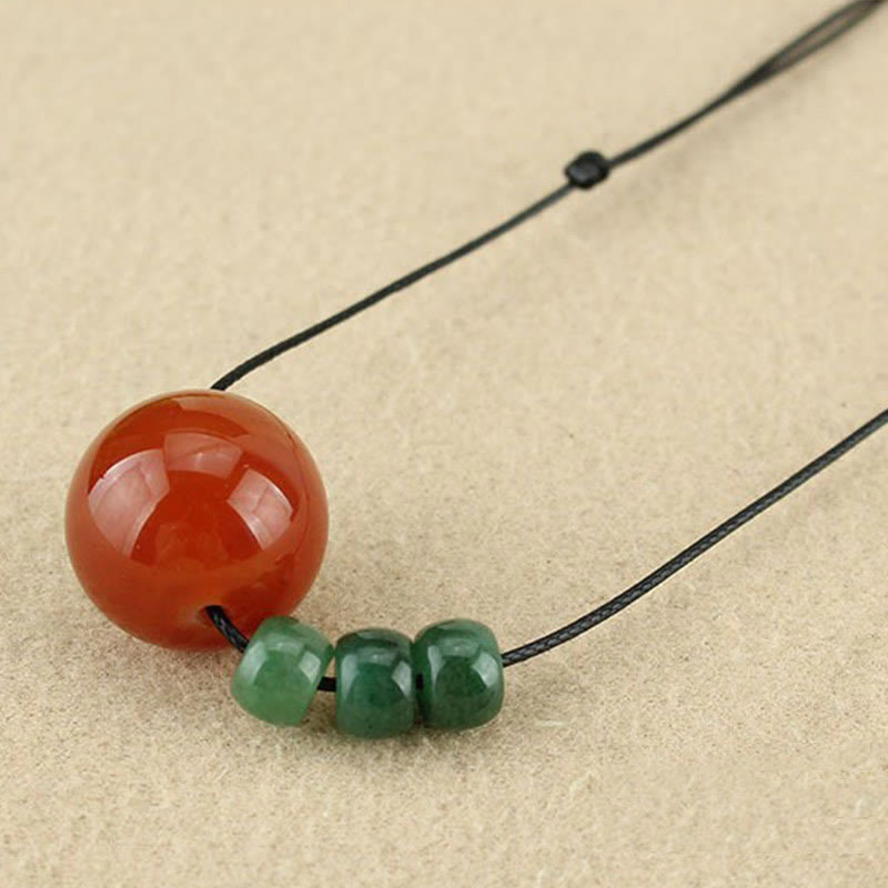 Buddha Stones Agata rossa Avventurina verde Perline di semi di Bodhi verde Collana con ciondolo in corda di cuoio calmo