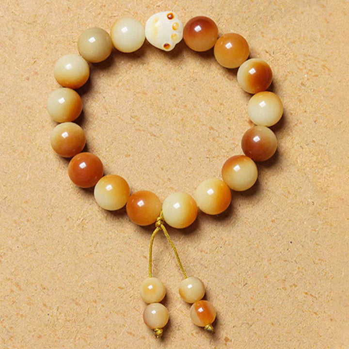 Buddha Stones Semi di Bodhi naturali Braccialetto di saggezza della pace con artigli di zampa adorabile