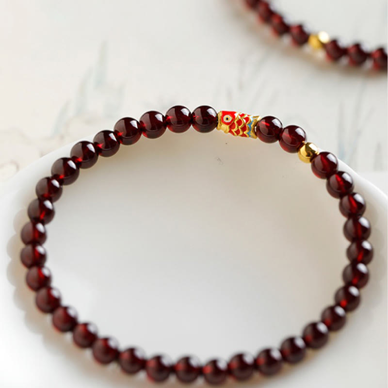 Braccialetto di protezione in granato naturale con pesce koi in oro 999 Buddha Stones - image 4