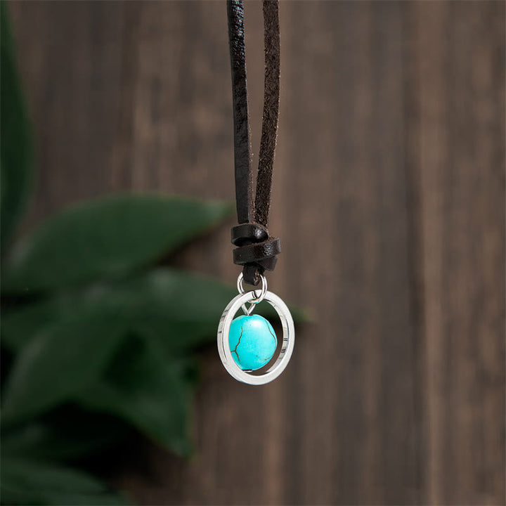Collana con ciondolo in pietra turchese rotonda con pietre Buddha Stones e forza di protezione - image 1
