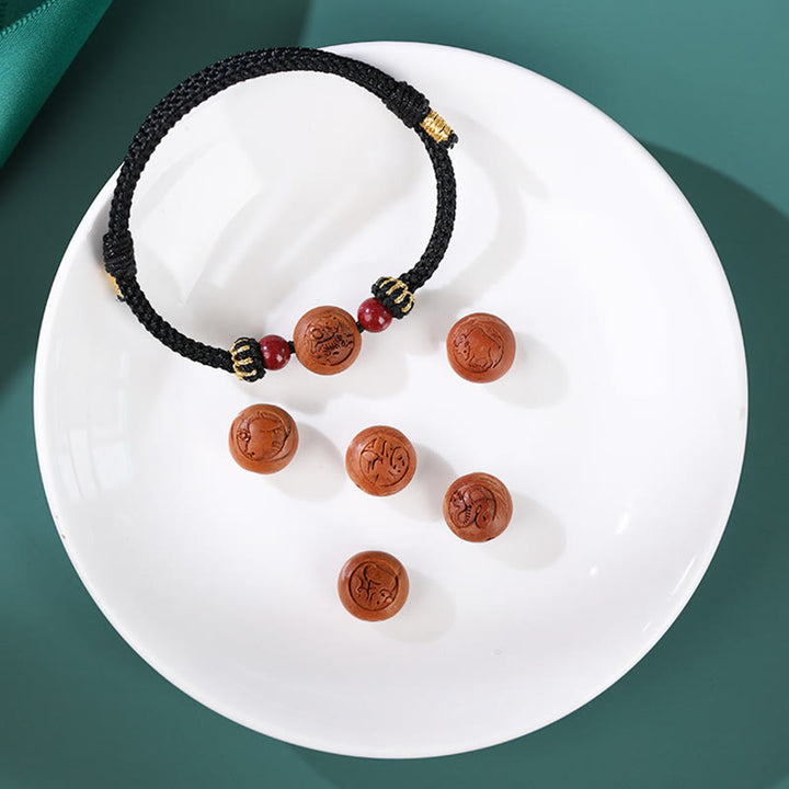 Braccialetto della ricchezza in cinabro intagliato con carattere dello zodiaco cinese Fu in legno di pesca naturale Buddha Stones - image 13