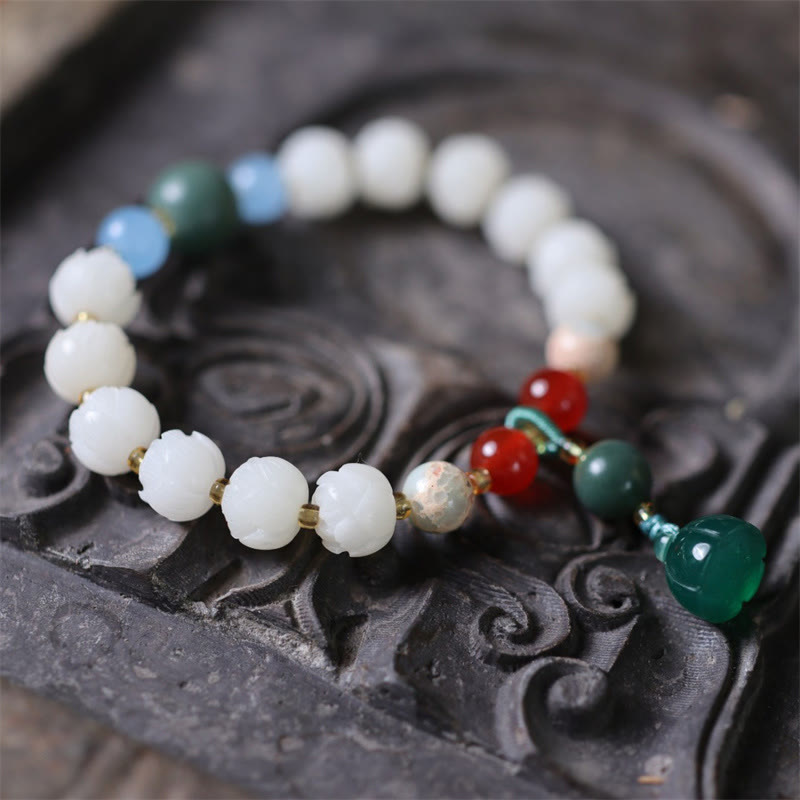 Braccialetto di armonia di pace intagliato con Buddha Stones
